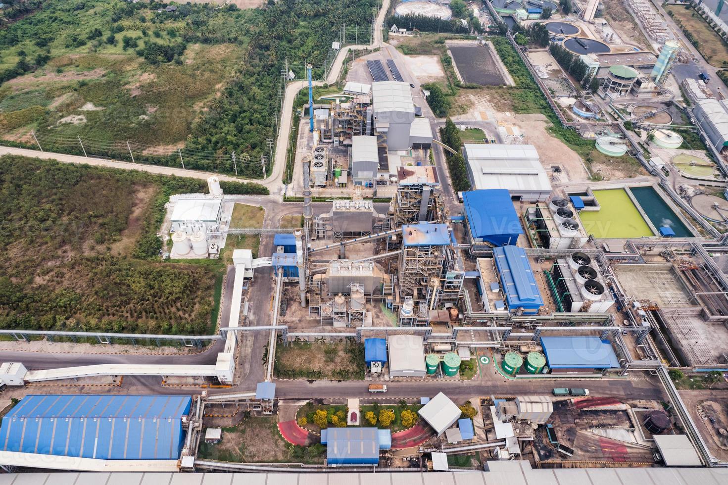 Aerial view of building infrastucture of industry power plant, smart chamical, gas and oil refinery pipeline warehouse photo