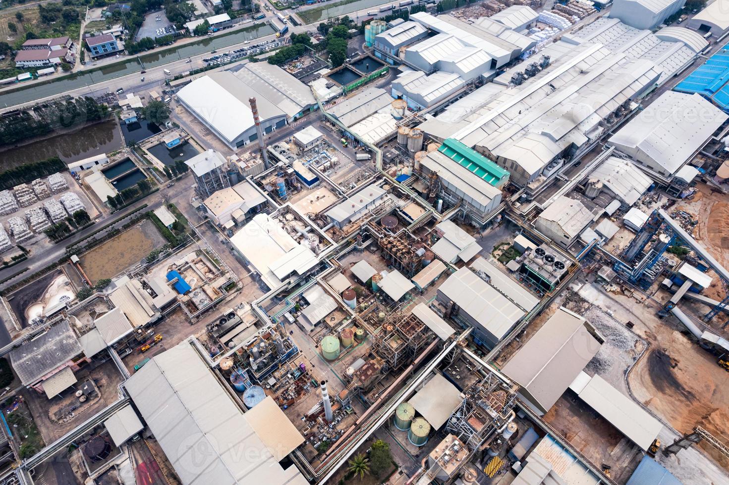 Aerial view of building infrastucture of industry power plant, smart chamical, gas and oil refinery pipeline warehouse photo