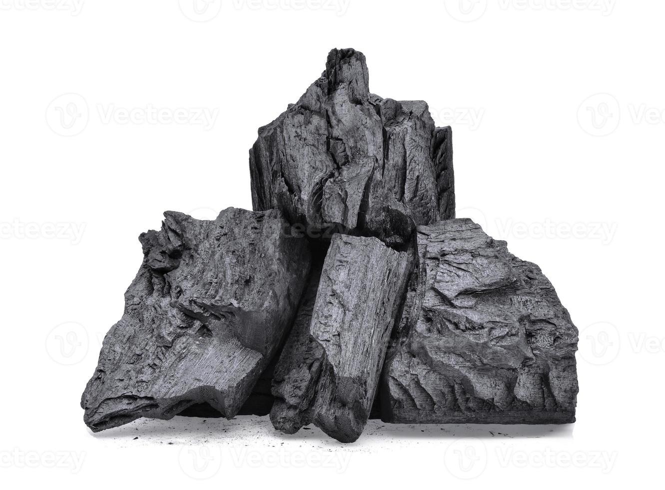 wood charcoal isolated on white background photo