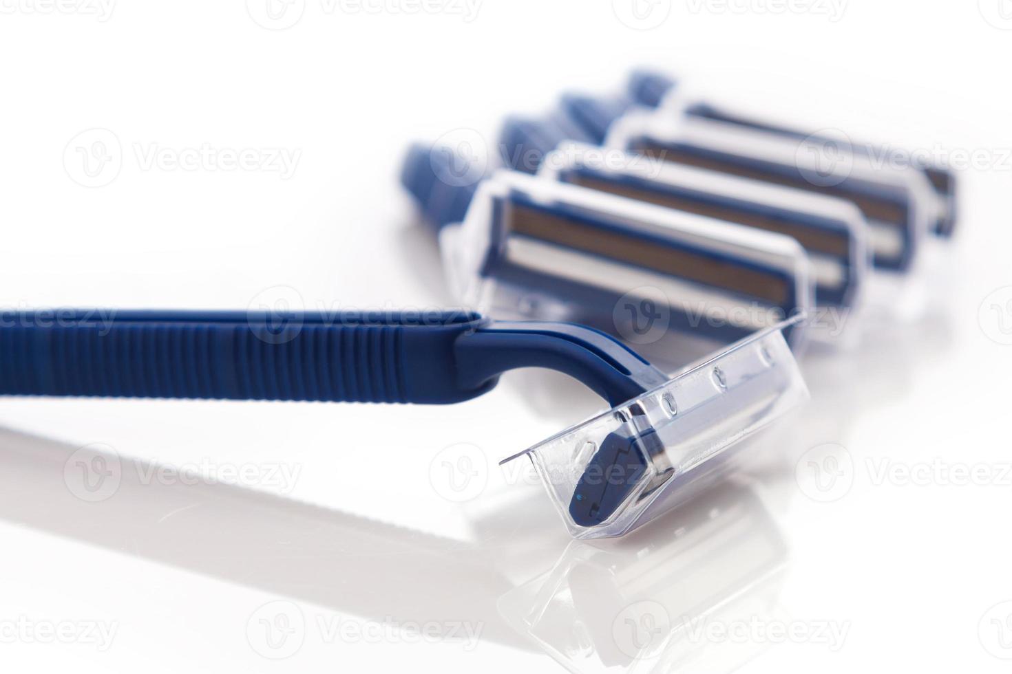 Shaving razor on white background photo