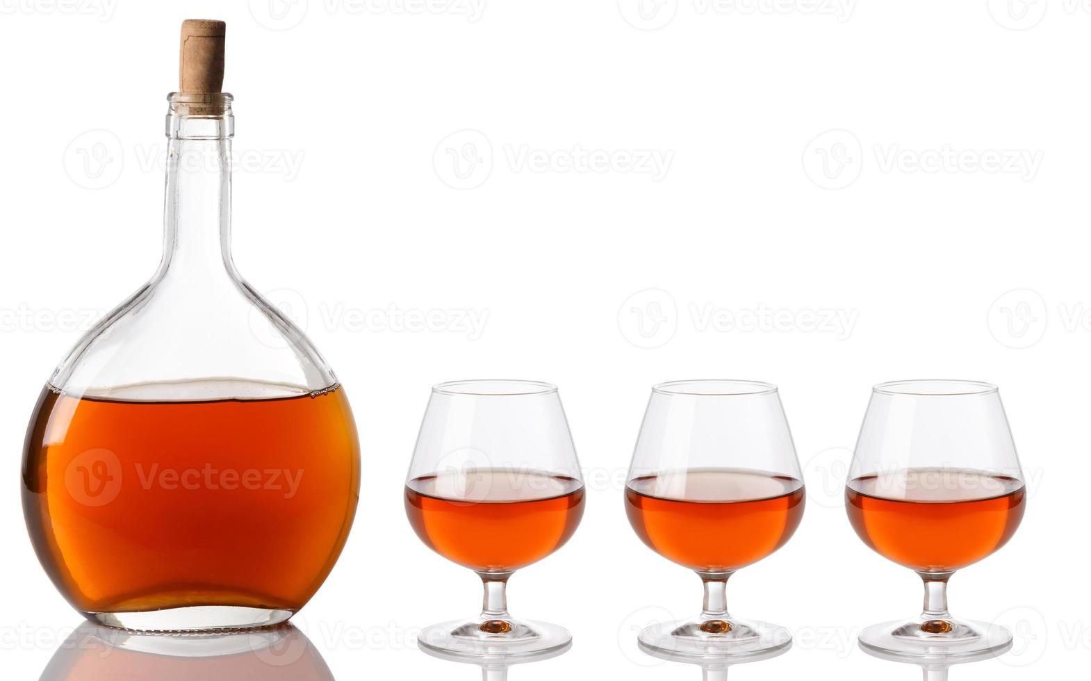 Bottle and glass with cognac photo