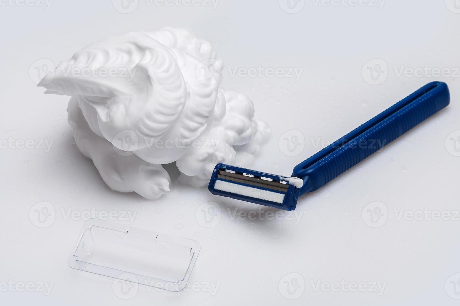 Shaving razor and foam photo