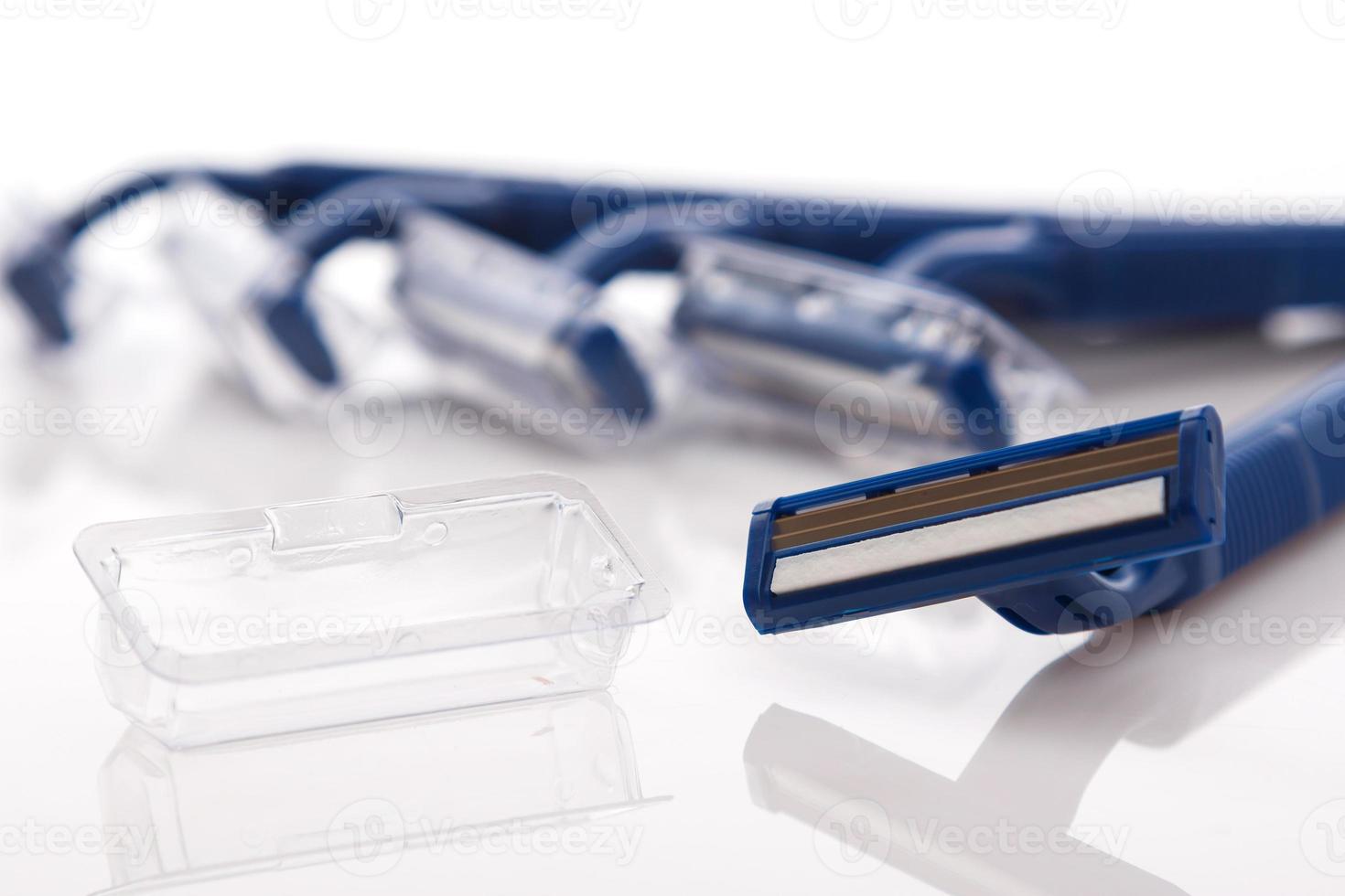 Shaving razor on white background photo
