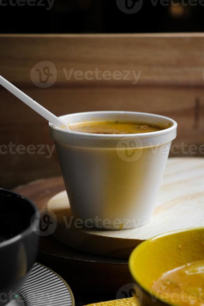 soup in a disposable cup front view photo