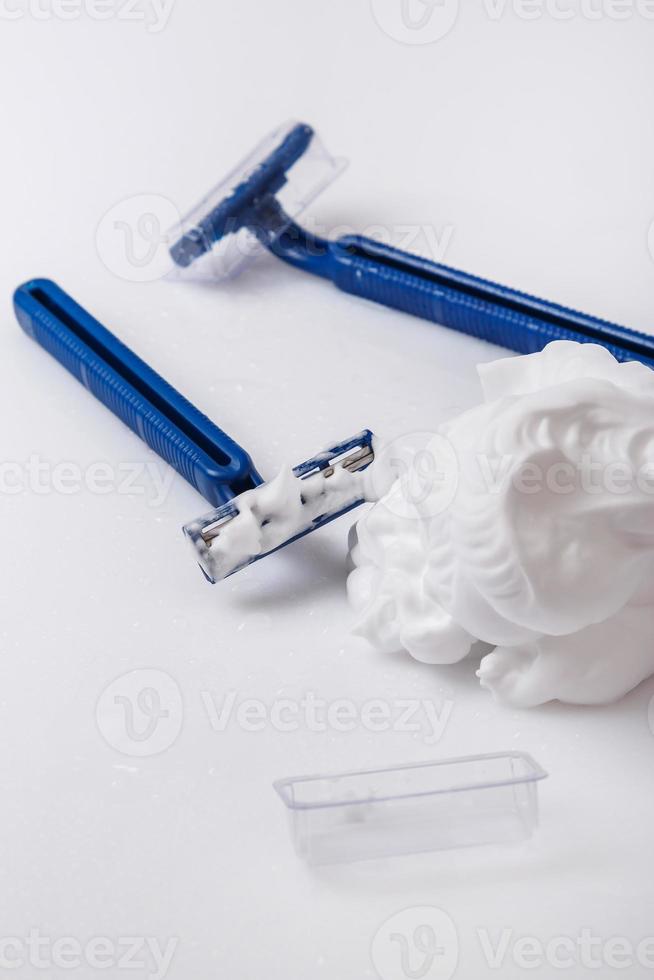 Shaving razors and foam photo