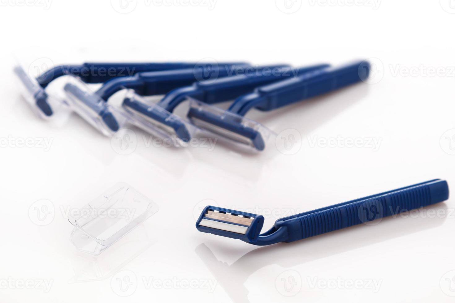 Shaving razor on white background photo
