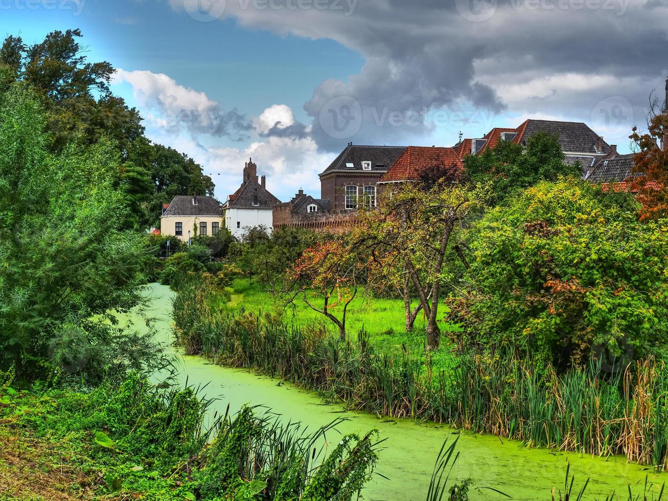 Zutphen at the river Ijssel in the netherlands photo