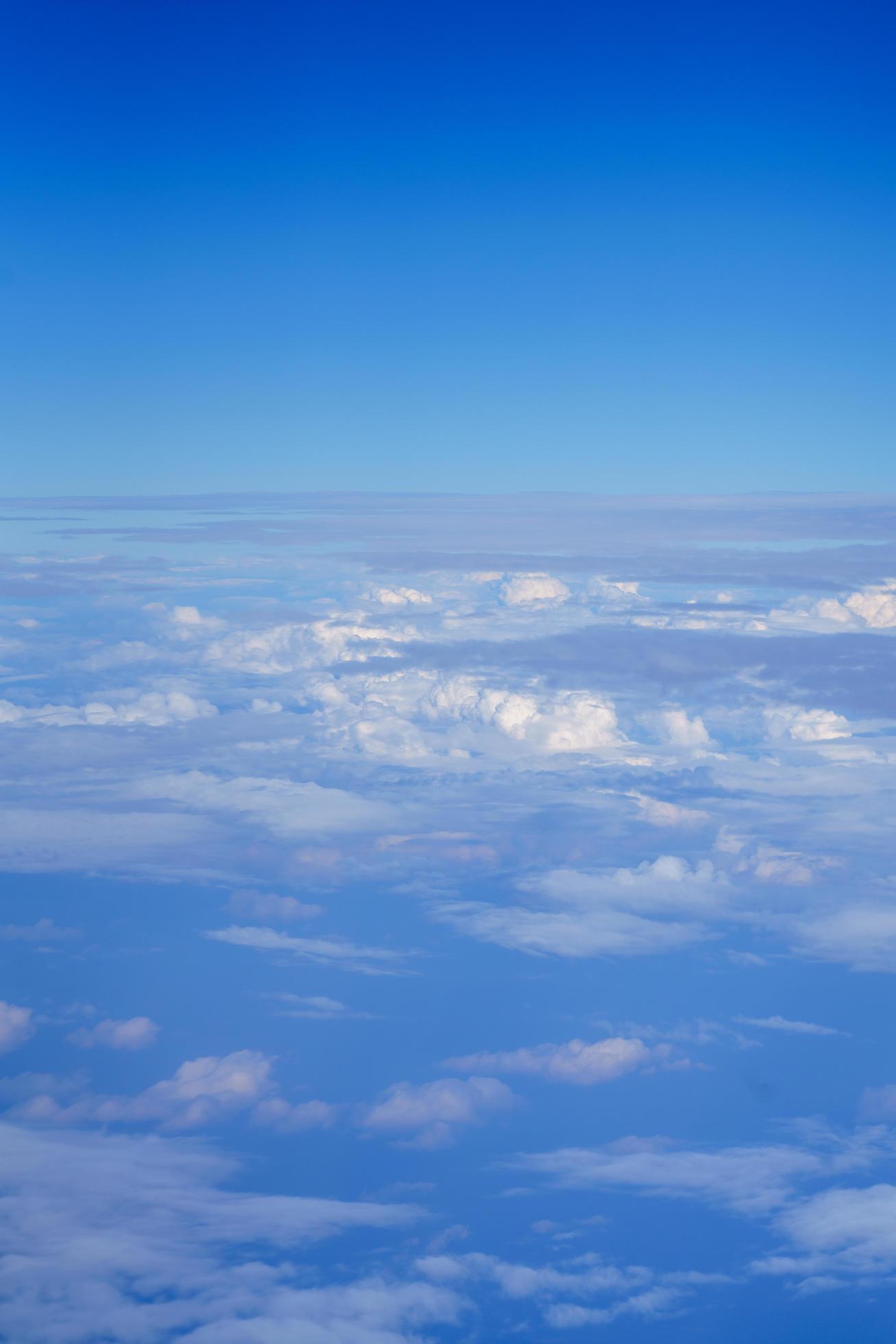 Nature view of blue sky with fluffy white cloud using for wallpaper