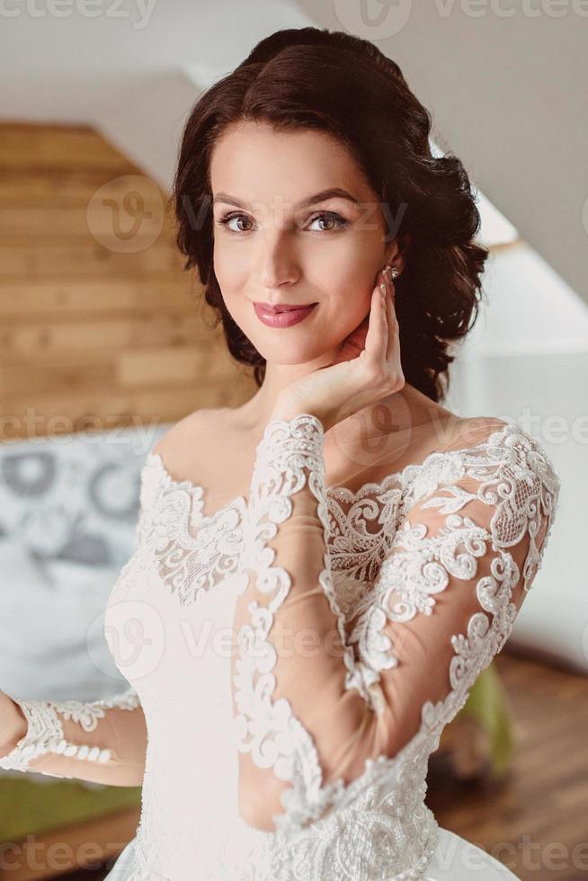 Caucasian female costume designer works on wedding gown - Stock Image -  Everypixel