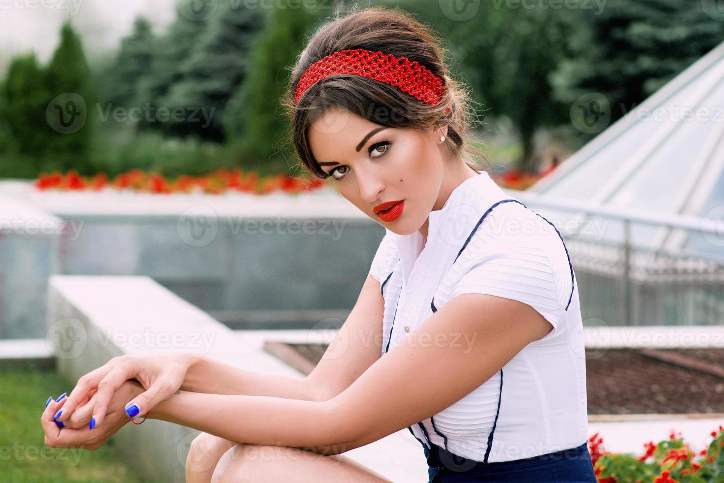Portrait of Stylish cool slim fit  woman in the city. Fashion, style, street style, trends, travel concept photo