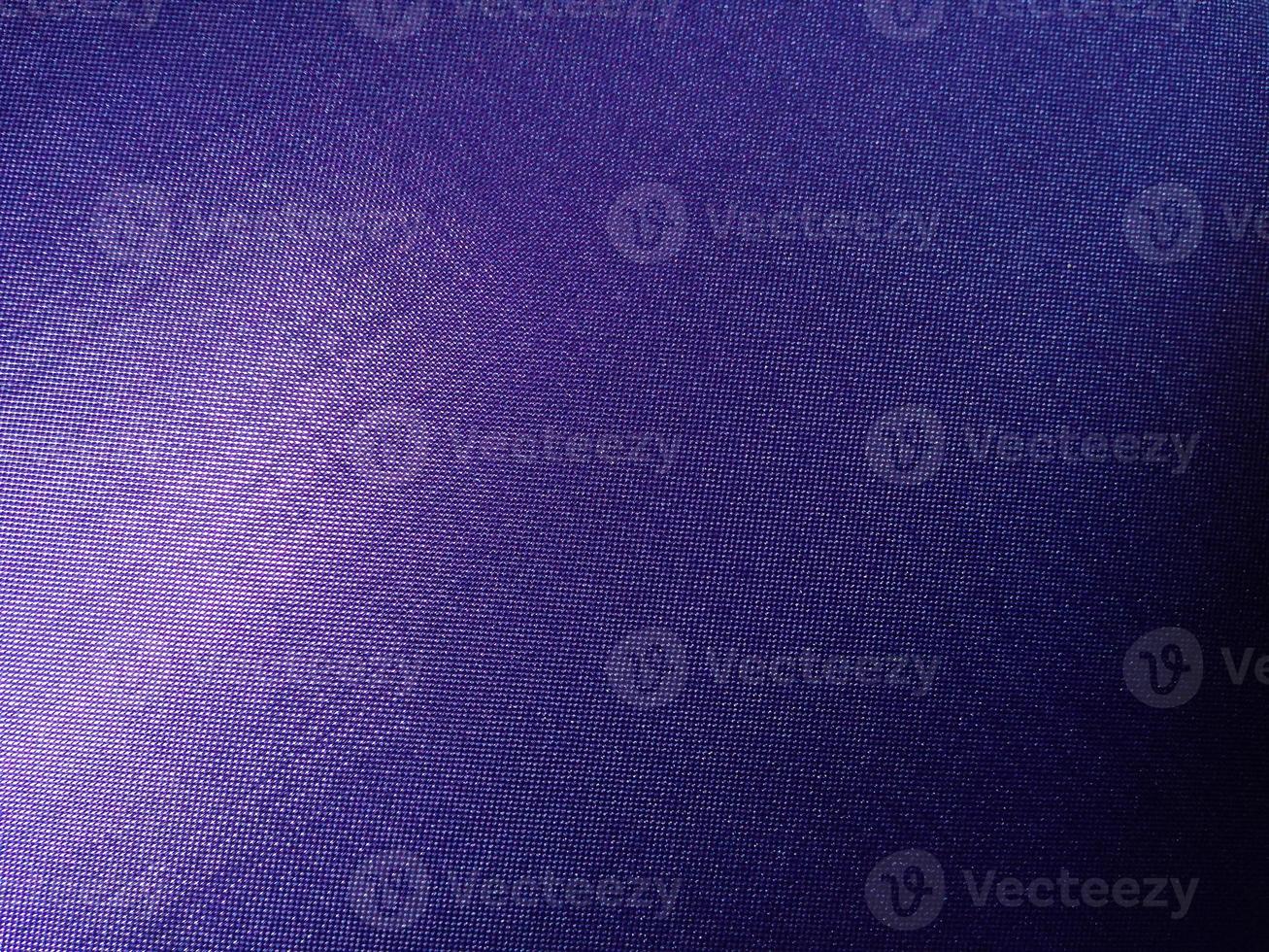 abstract blue synthetic fabric with gradient pattern. photo