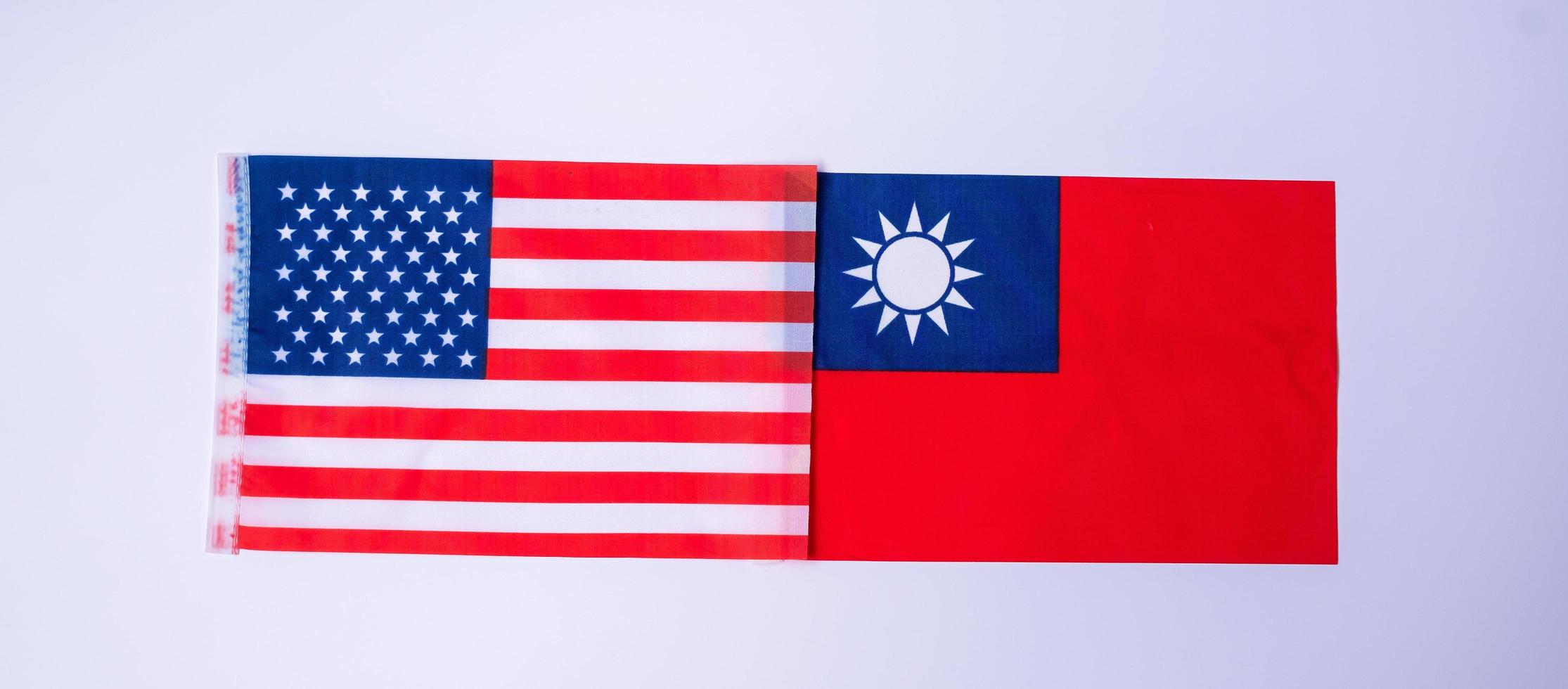 America against Taiwan flags. freindship, war, conflict, Politics and relationship concept photo