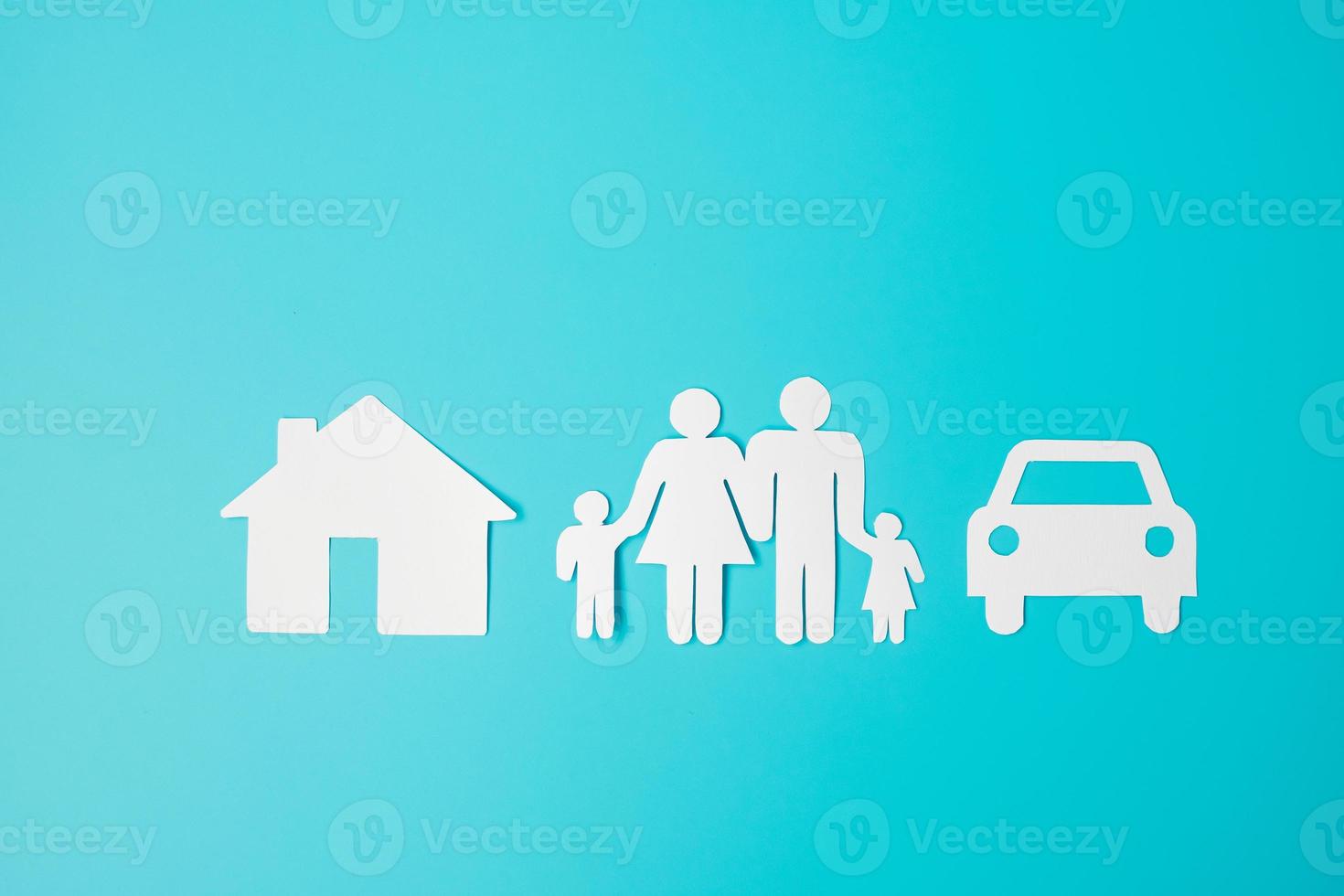 Happy Family day. paper shape cutout with Father, Mother, Children, Home and Car. international day of families, Warm home, love, Insurance, Life and Wellness concepts. photo