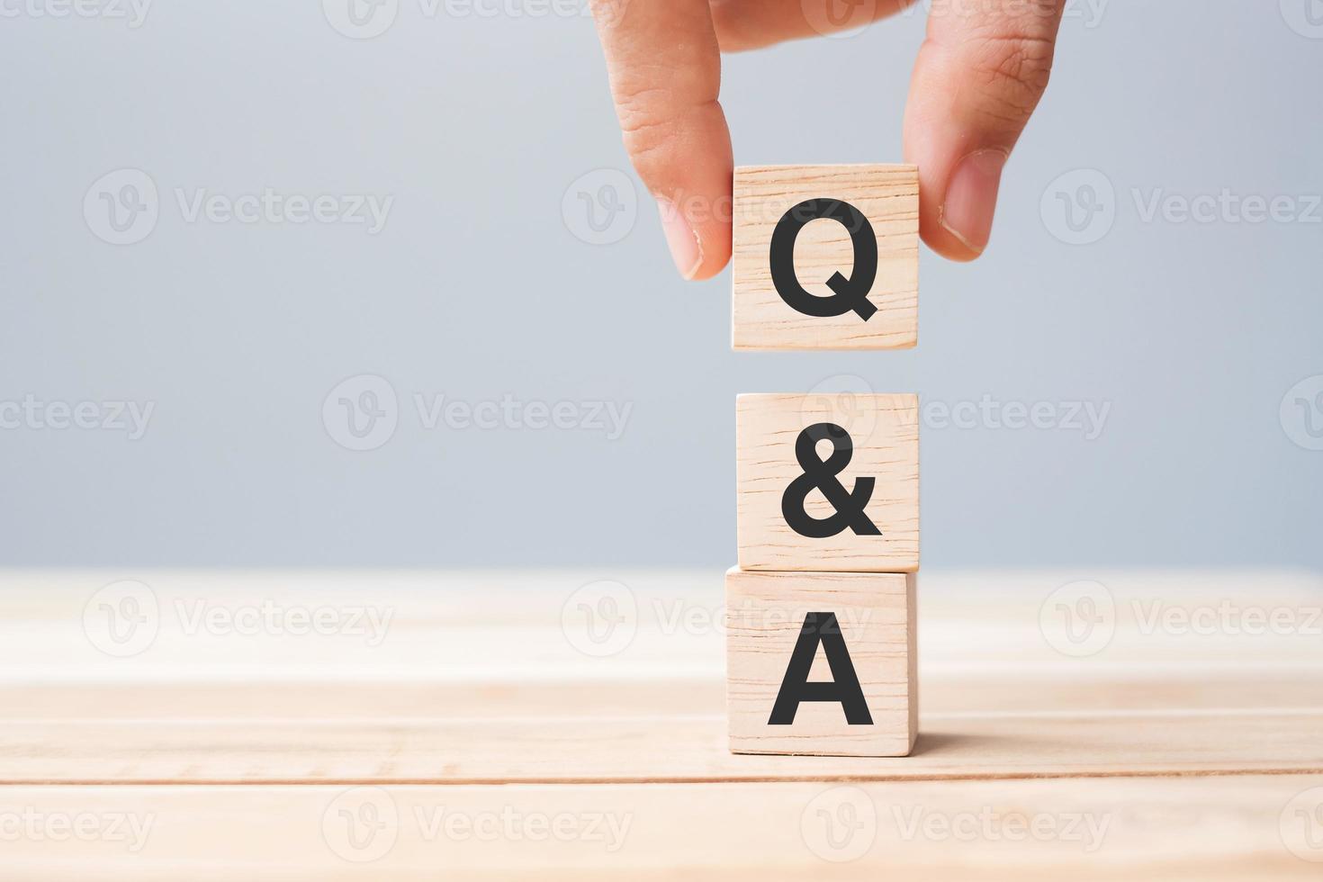 Q and A word with wooden cube block. FAQ, frequency asked questions, Answer, Question  Ask, Information, Communication and Brainstorming Concepts photo