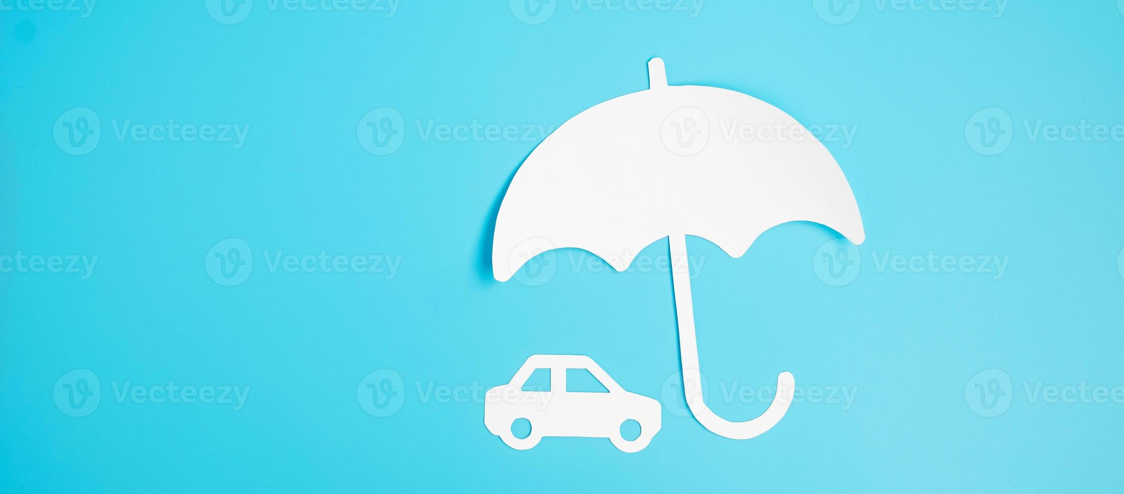 Umbrella cover Car paper on blue background. Warranty, Maintenance, Vehicle and insurance concept photo