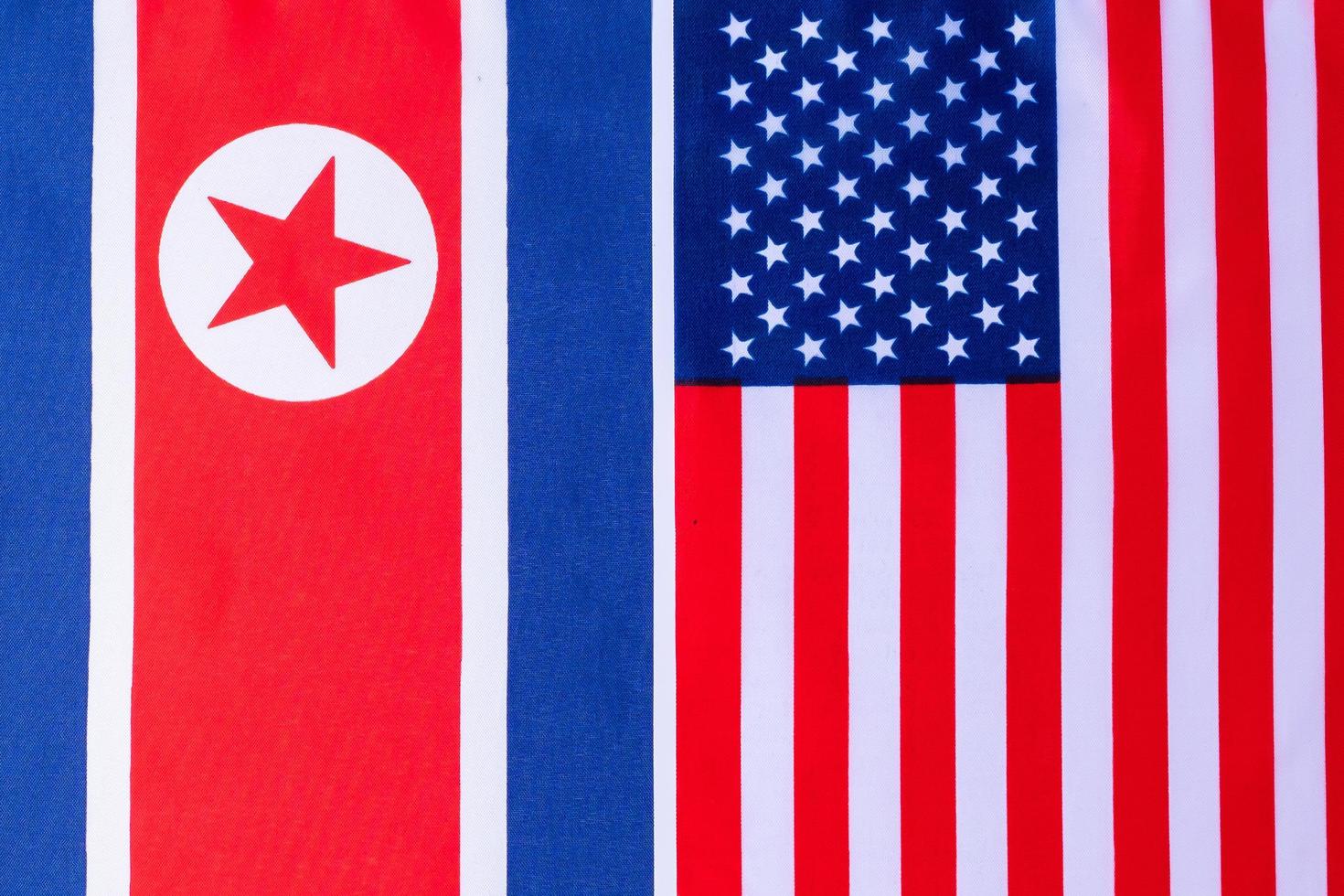 United state of America against North Korea flags. Sanctions, war, conflict, Politics and relationship concept photo