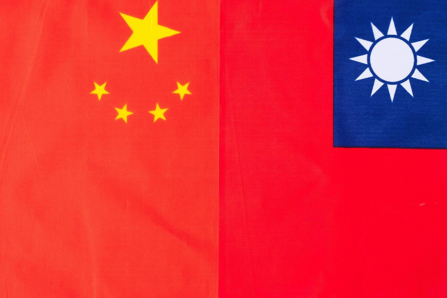 Taiwan against China flags. Sanctions, war, conflict, Politics and relationship concept photo
