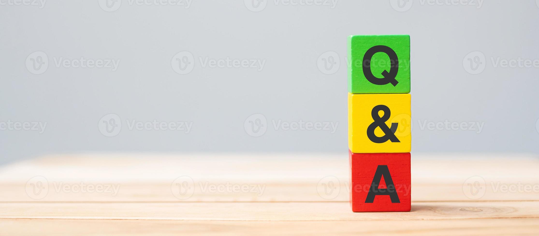 Q and A word with wooden cube block. FAQ, frequency asked questions, Answer, Question  Ask, Information, Communication and Brainstorming Concepts photo