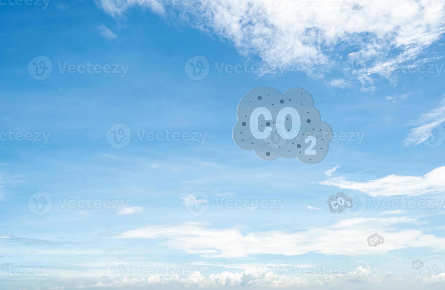CO2 symbol on blue sky and white clouds. CO2 emissions. Greenhouse gas. Carbon dioxide gas global air climate pollution. Environment issue. Background for carbon capture and storage technology. photo
