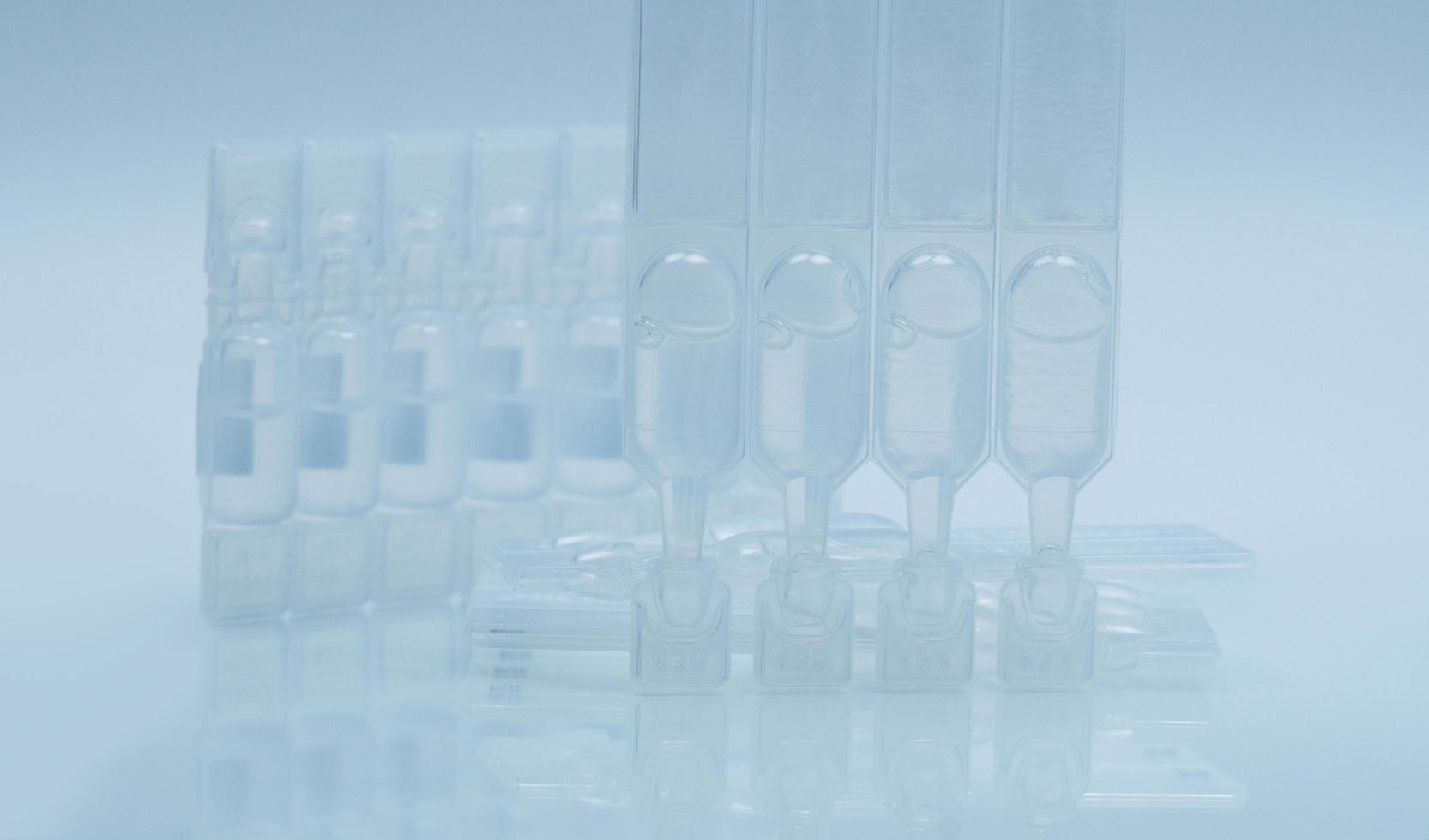Artificial tears in one day use packaging container with re-closable multi-dose vials. Lubricant eye drops with preservative free. photo