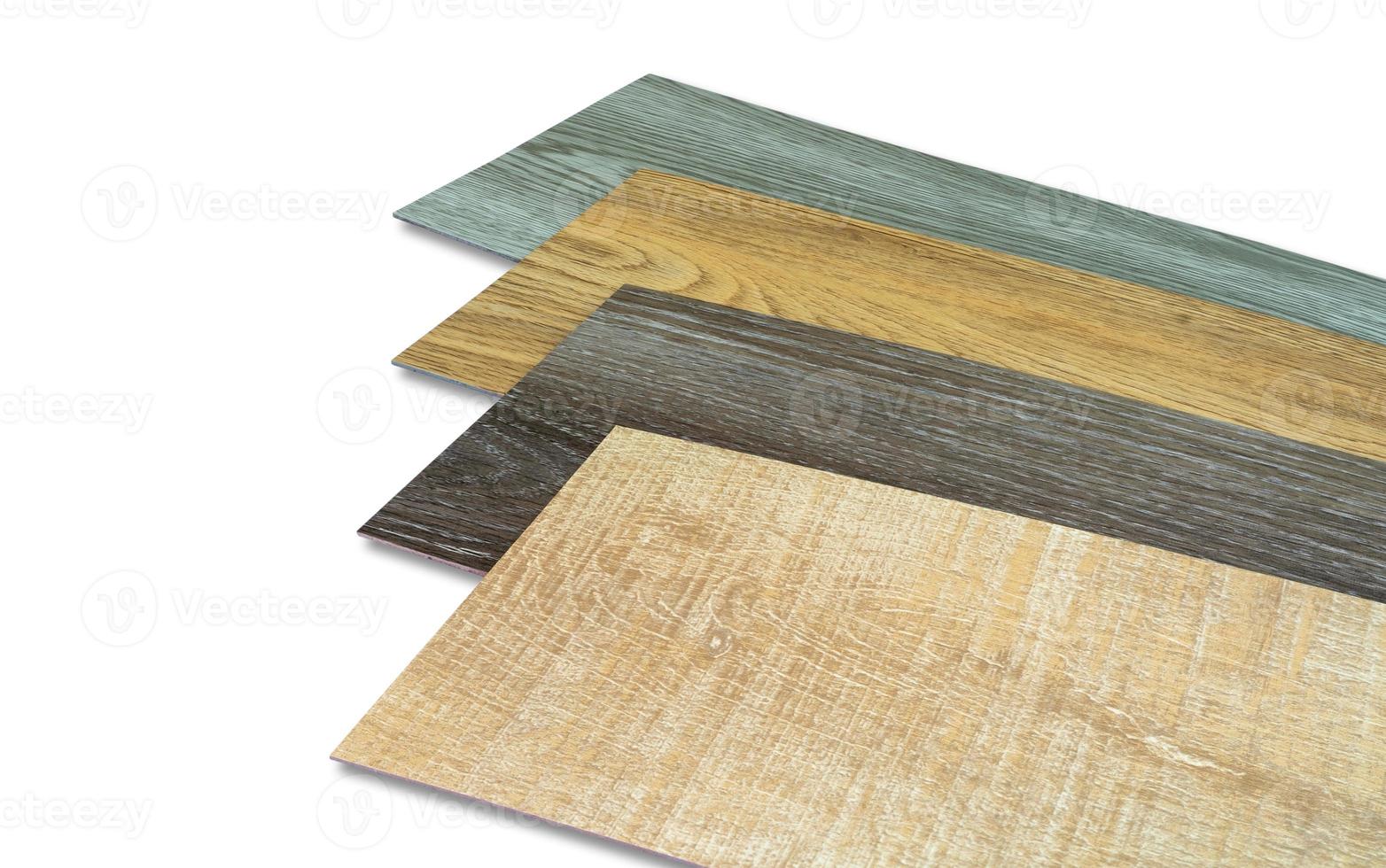 Vinyl tiles stack sample collection for interior designer. New wooden pattern vinyl tile. Vinyl flooring material isolated on white background. Polymer vinyl sheet set for new home floor. PVC material photo