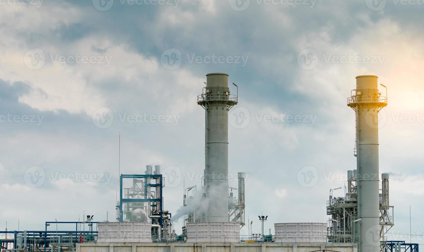 Gas turbine electrical power plant. Energy for support factory in industrial estate. Natural gas tank. Power plant using natural gas for fuel. Generate electricity. Cooling tower and pressure tank. photo