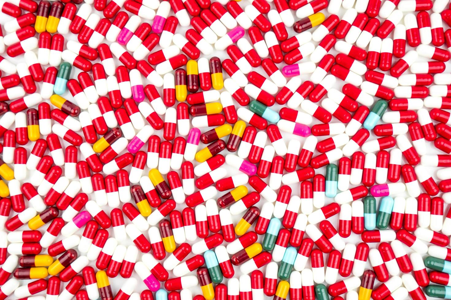 Colorful of antibiotic capsules pills isolated on white background. Drug resistance concept. Antibiotics drug use with reasonable and global healthcare concept. photo