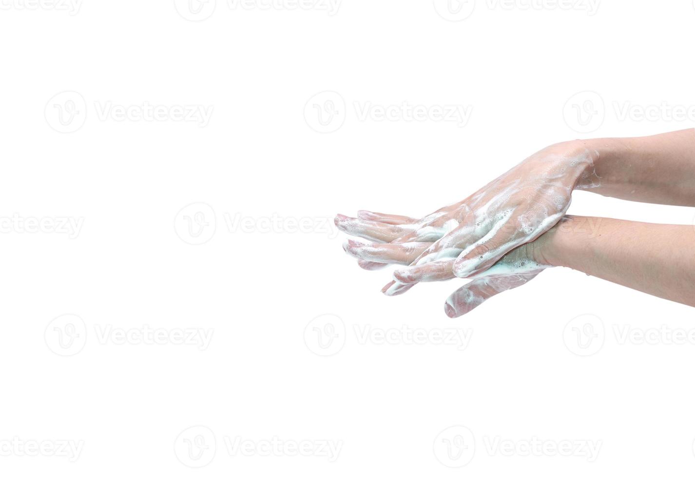 Woman washing hand with soap foam and water. Hand clean for good personal hygiene to prevent coronavirus or flu epidemic.Procedure of hand wash to kill germs, virus, bacteria. Cleaning dirty hands. photo