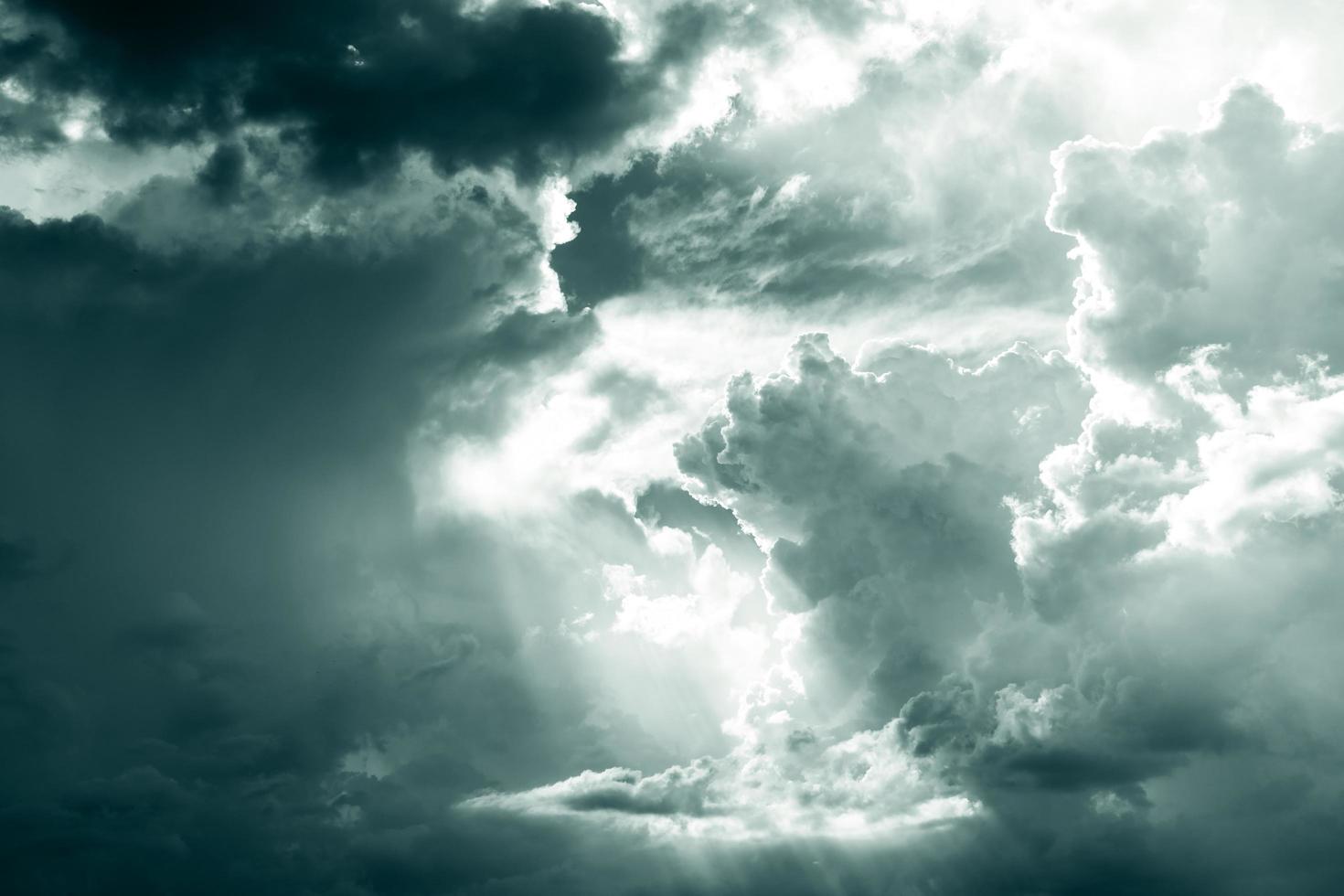 Gray and white fluffy clouds. Cloudy sky. White and gray texture background for sad, death, hopeless, and despair concept. Moody sky. Cloudscape. Dark dramatic sky. Background for dead and gloomy. photo