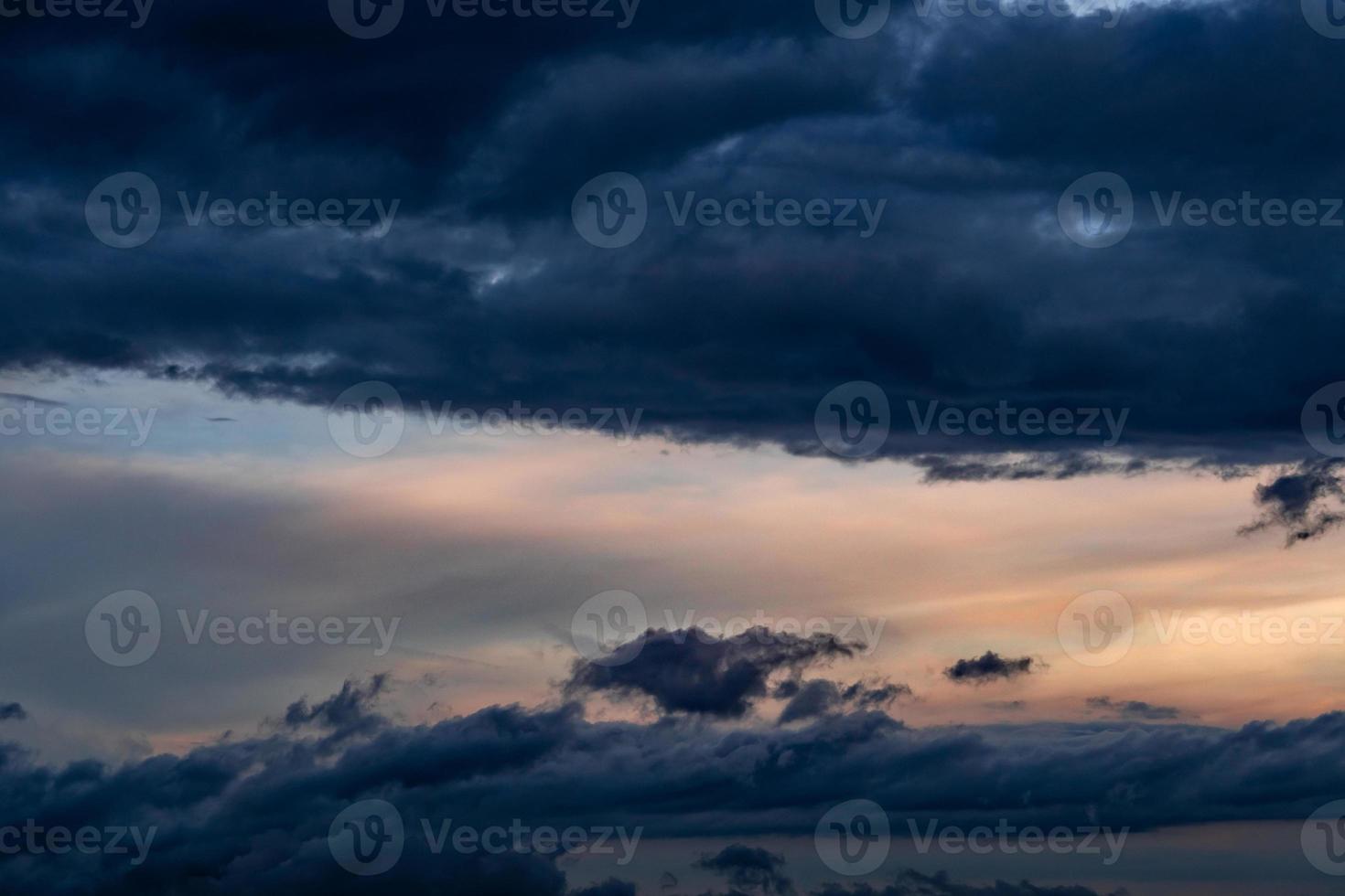 Beautiful sunset sky. Orange, blue, and white sky. Colorful sunrise. Art picture of sky at sunrise. Sunrise and clouds for inspiration background. Nature background. Peaceful and tranquil concept. photo