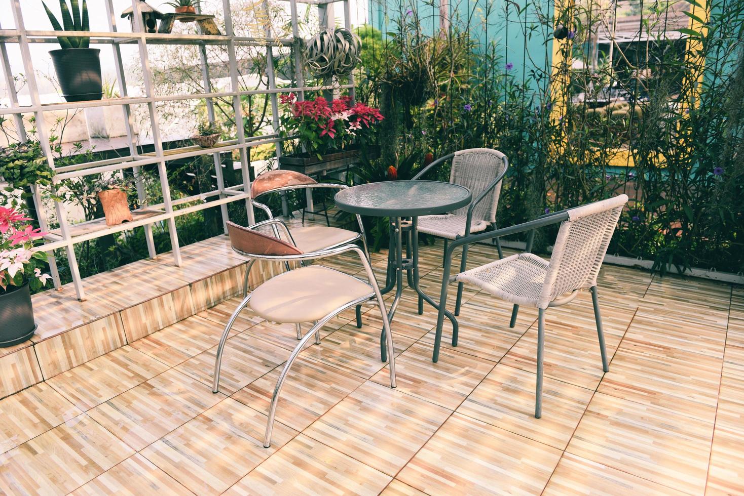 Home gardening and decorating indoor microgreen greenhouse environments secret gardens and modern gardening setups flowers and ornamental plants gardening and greenery in workspaces table and chairs photo