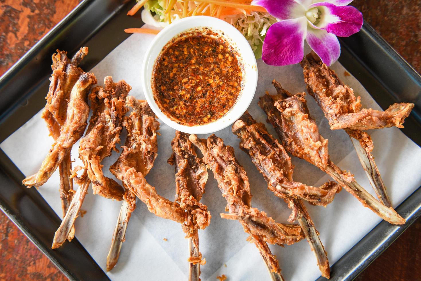 Deep fried duck mouth, Food cooked duck head Thai and Chinese traditional cuisine photo