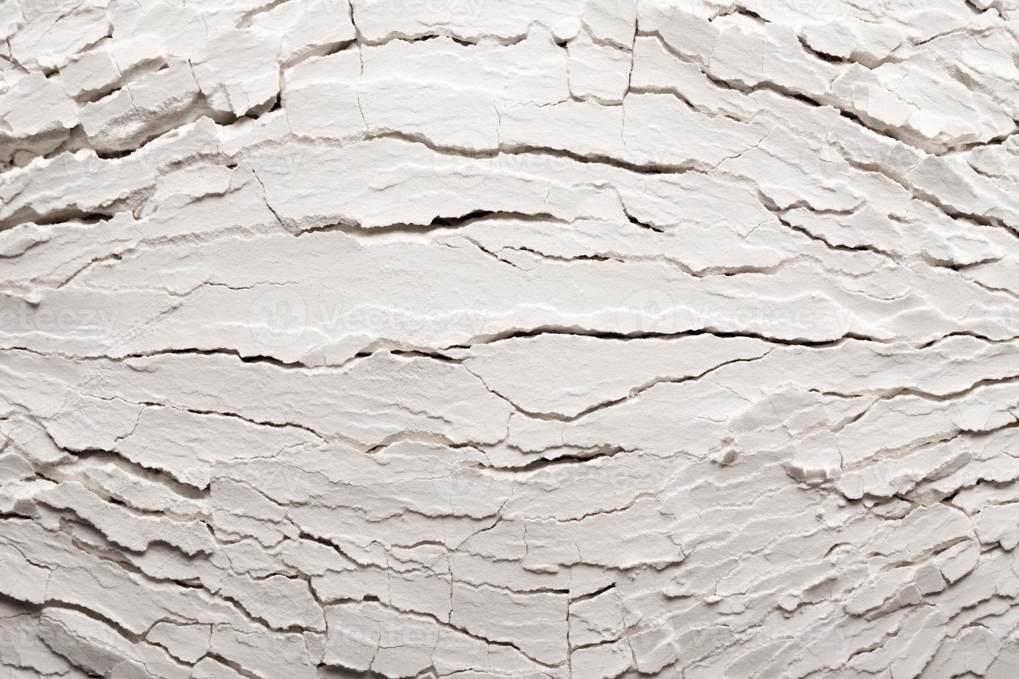 White abstract background with cracks. White background with seamless pattern. photo