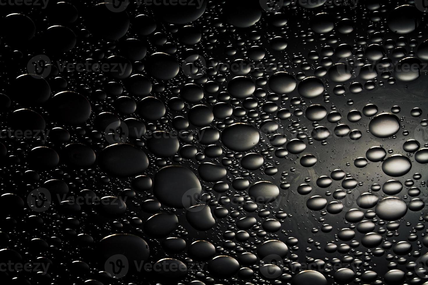 Abstract shiny background with droplets in black and white. photo