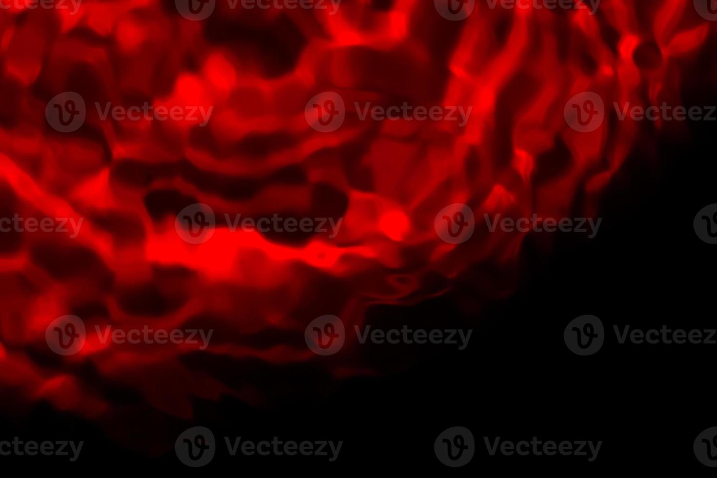 Red and black blurry abstract background in a low key. Abstract red background with seamless pattern in blue. photo