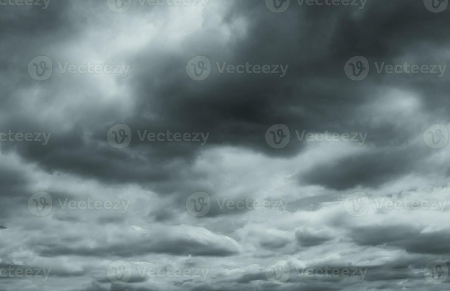 Gray and white fluffy clouds. Cloudy sky. White and gray texture background for sad, death, hopeless, and despair concept. Moody sky. Cloudscape. Dark dramatic sky. Background for dead and gloomy. photo