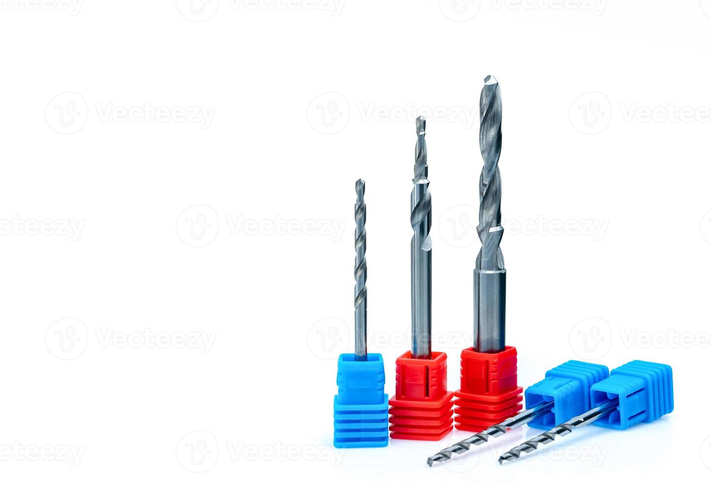 Special tools isolated on white background. Made to order special tools. Coated step drill detail. HSS cemented carbide. Carbide drilling tool for industrial applications. Engineering tools. Drilling. photo