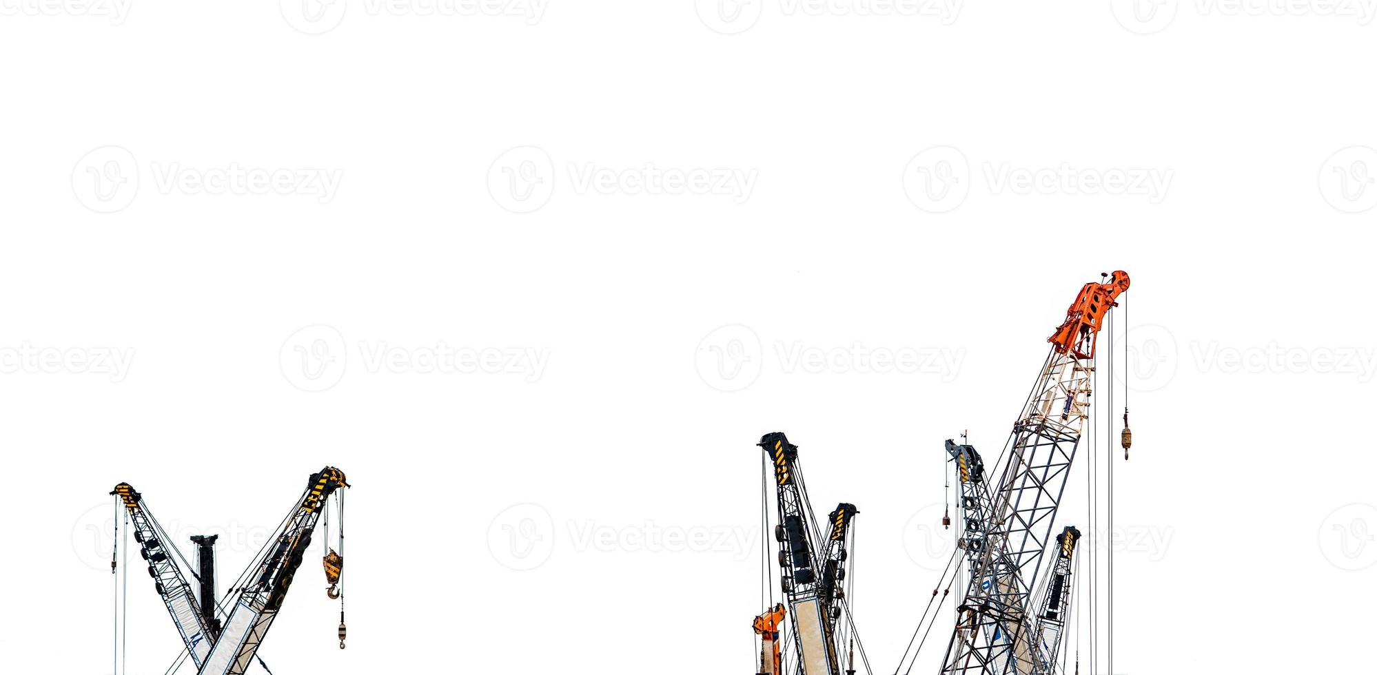 Set of big construction crane for heavy lifting isolated on white background. Construction industry. crane for container lift or at construction site. Crane rental business concept. Crane dealership. photo