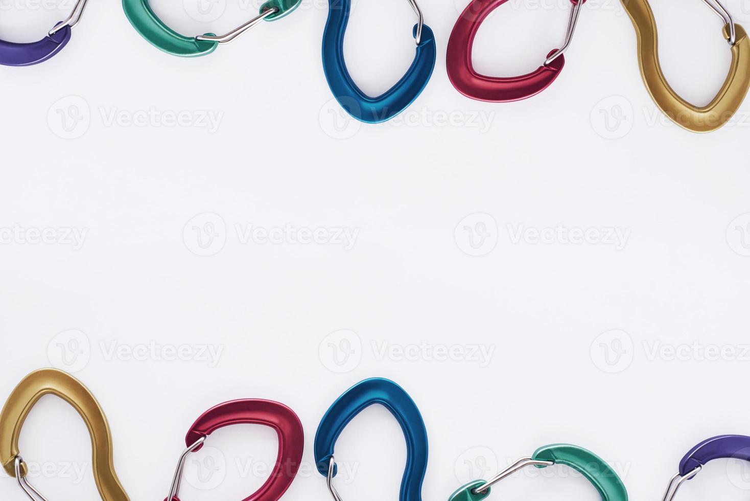 Gorgeous background. Top view. Climbing equipment for the safeness lying on the white table. Conception of extreme sports photo