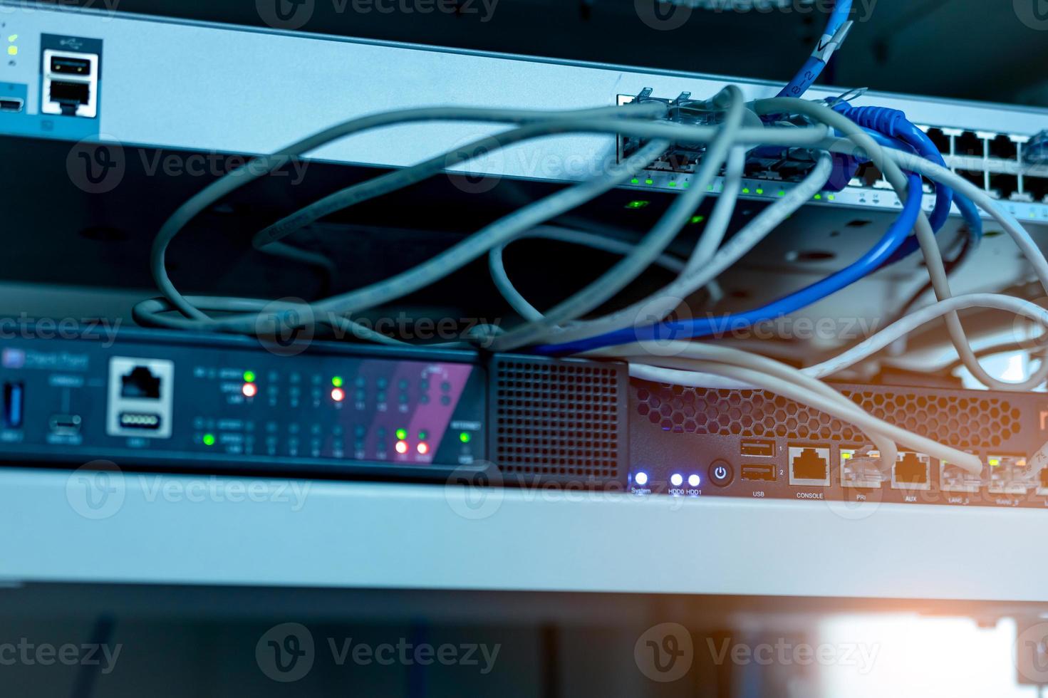 Ethernet cables and Network switch in data center. Wifi plug of internet router for computer. Network hub. Checkpoint equipment for data security. Communication networking wireless. Internet network. photo