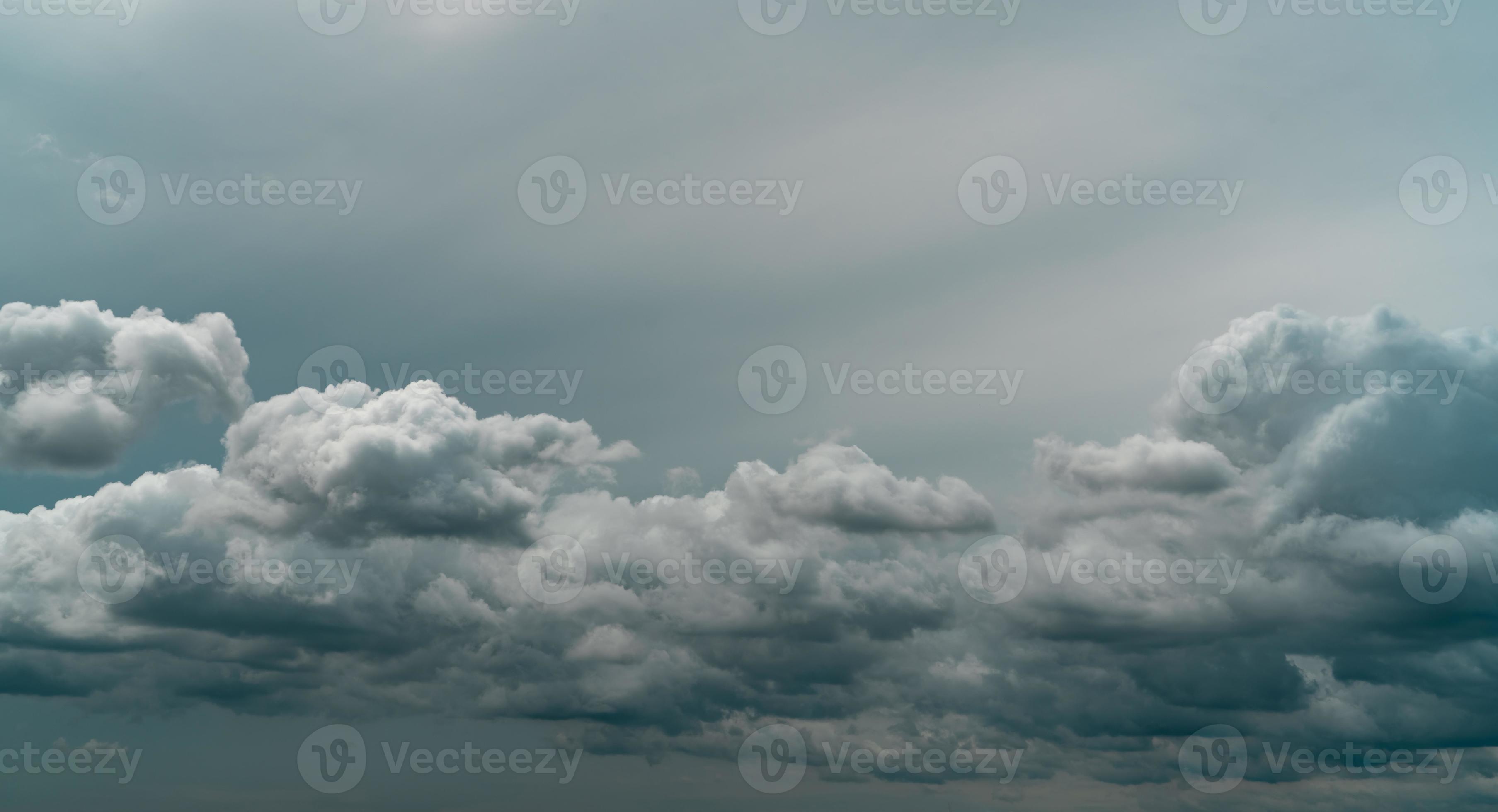Panorama view of overcast sky. Dramatic gray sky and white clouds