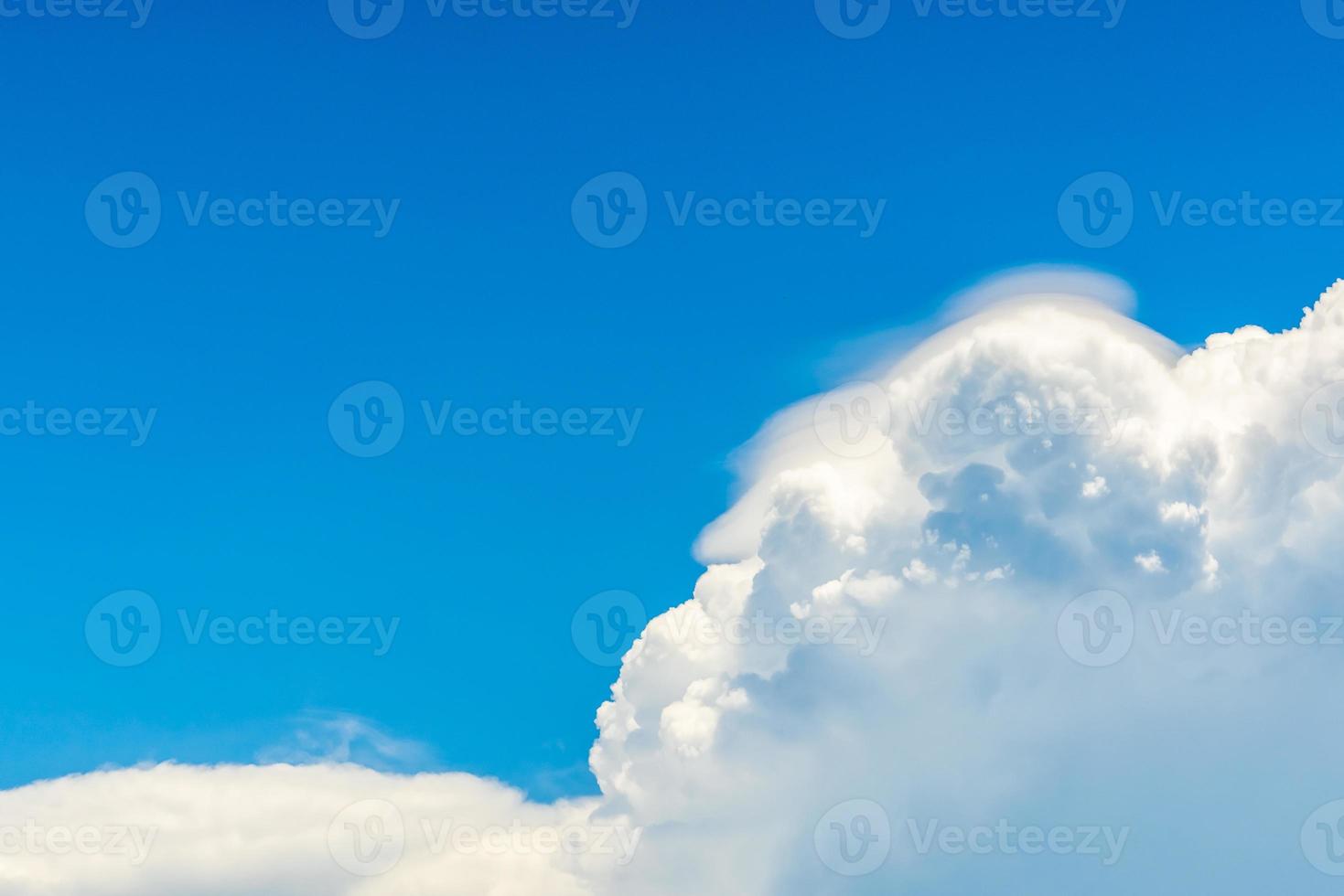 Beautiful blue sky and white cumulus clouds abstract background. Cloudscape background.  Blue sky and fluffy white clouds on sunny day. Nature weather. Bright sky and puffy clouds for happy day. photo
