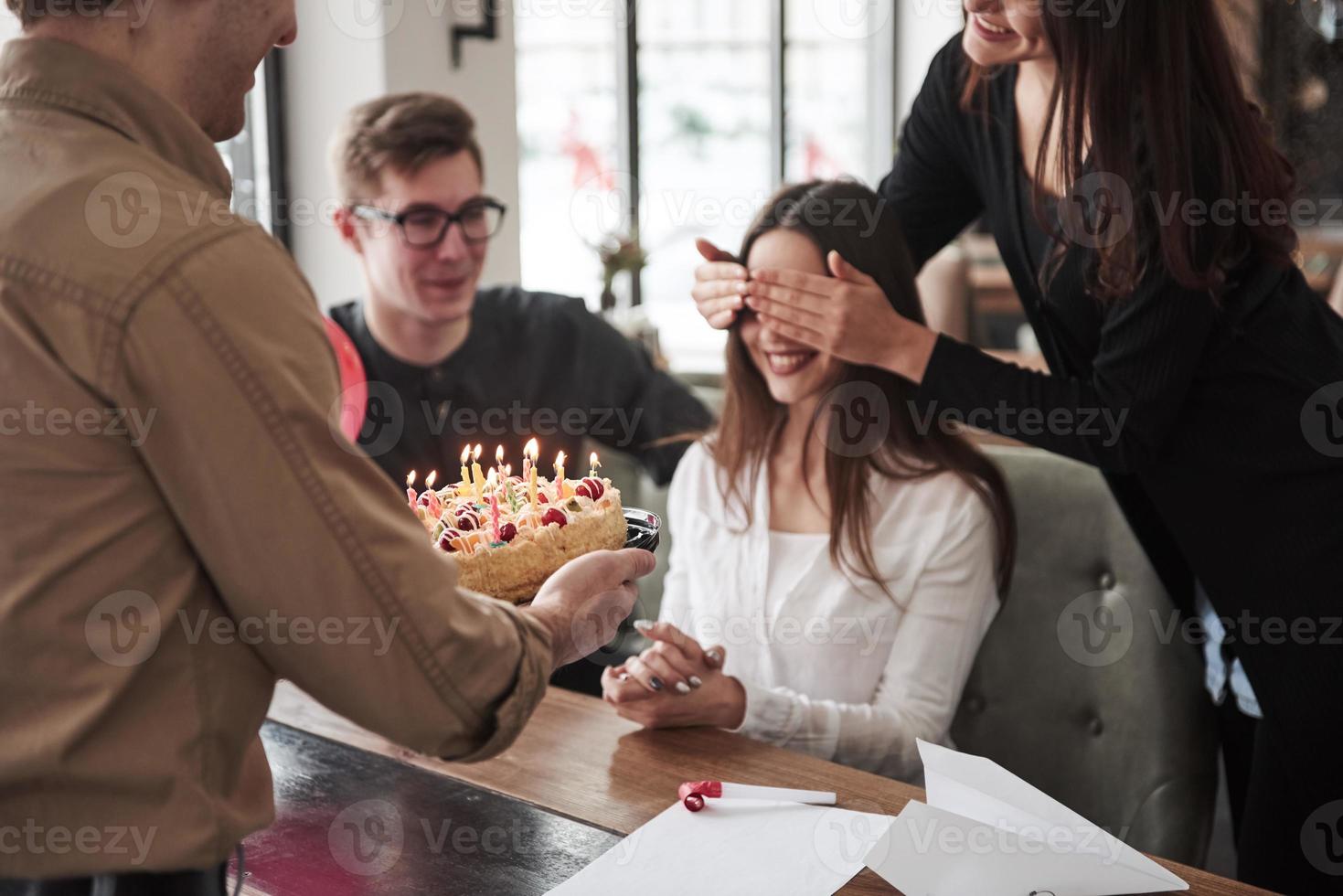 Surprise is coming. One of employees have birthday today. Friendly coworkers decides to make surprise for her photo