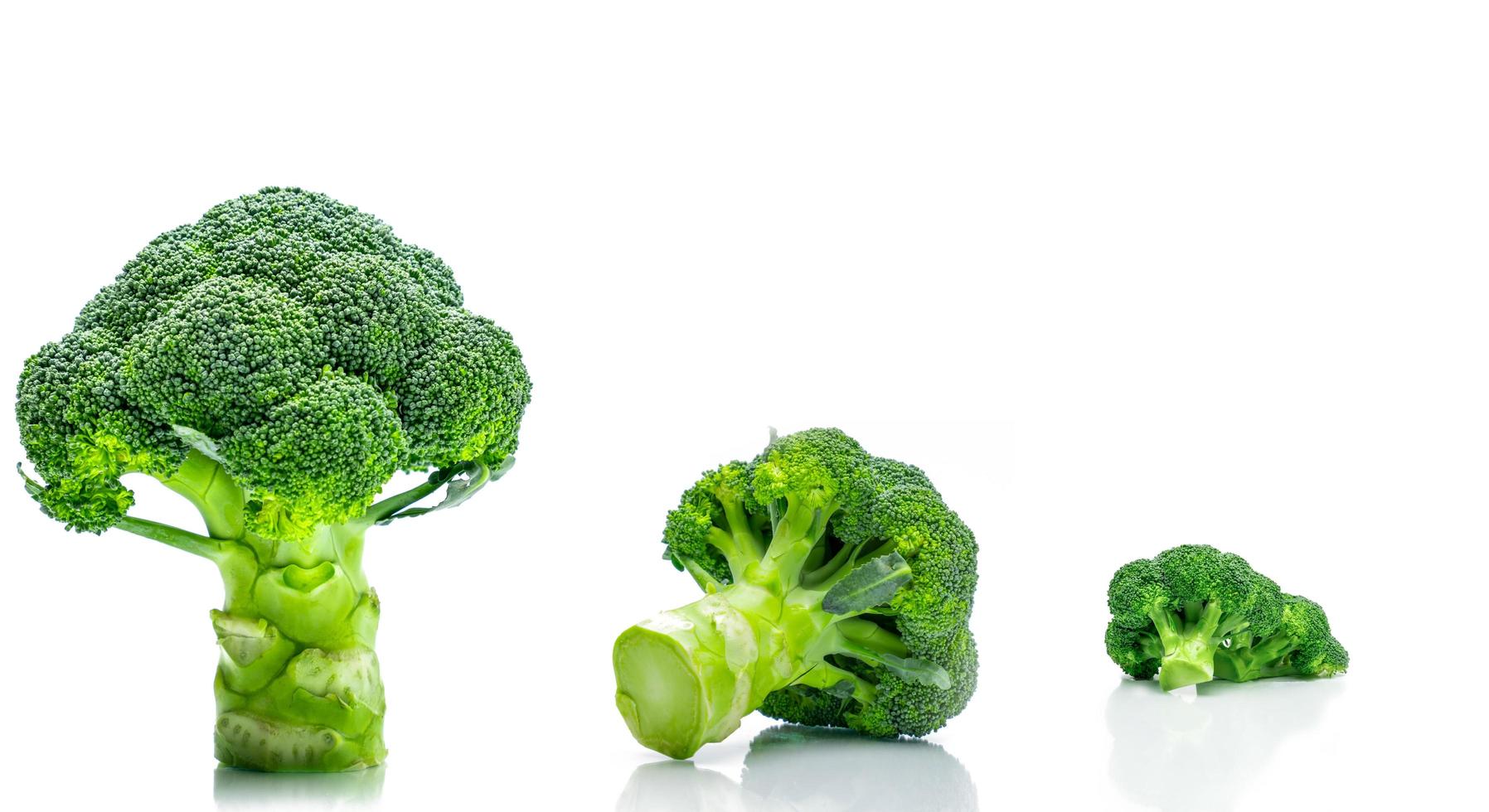 Set of green broccoli Brassica oleracea. Vegetables natural source of betacarotene, vitamin c, vitamin k, fiber food, folate. Fresh broccoli cabbage isolated on white background. photo