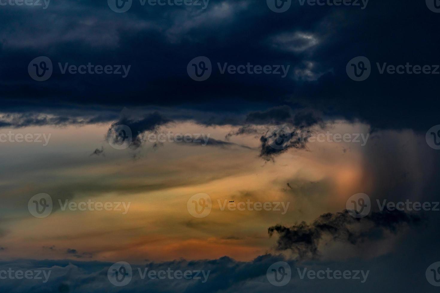 Beautiful sunset sky. Orange, blue, and white sky. Colorful sunrise. Art picture of sky at sunrise. Sunrise and clouds for inspiration background. Nature background. Peaceful and tranquil concept. photo