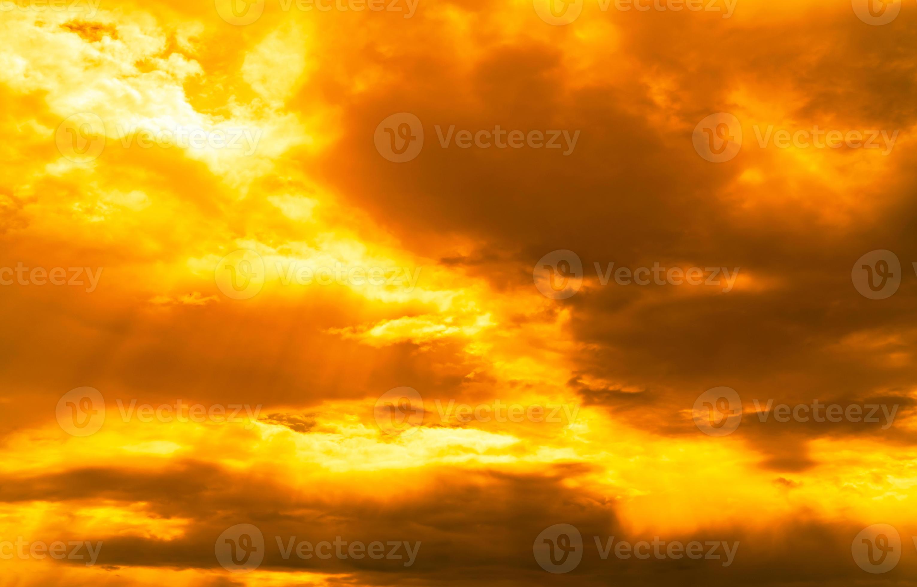 God light. Dramatic golden cloudy sky with sun beam. Yellow sun rays  through golden clouds. God light from heaven for hope and faithful concept.  Believe in god. Beautiful sunlight sky background. 7773447