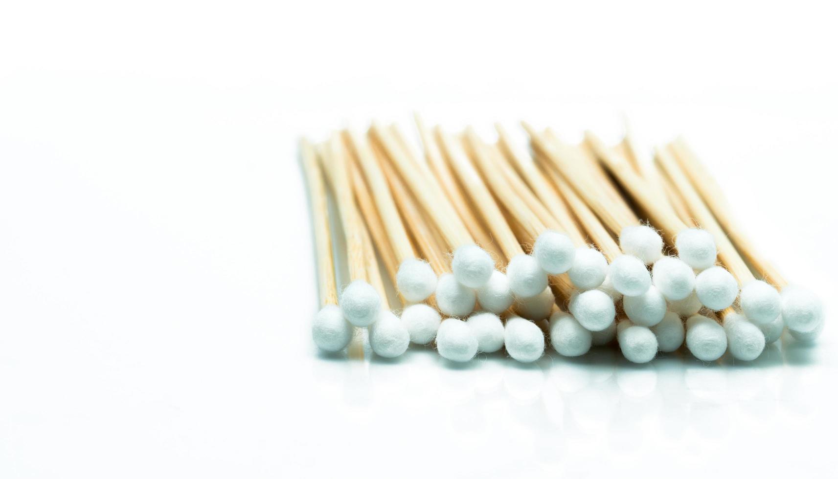 Cotton sticks isolated on white background with copy space for text photo