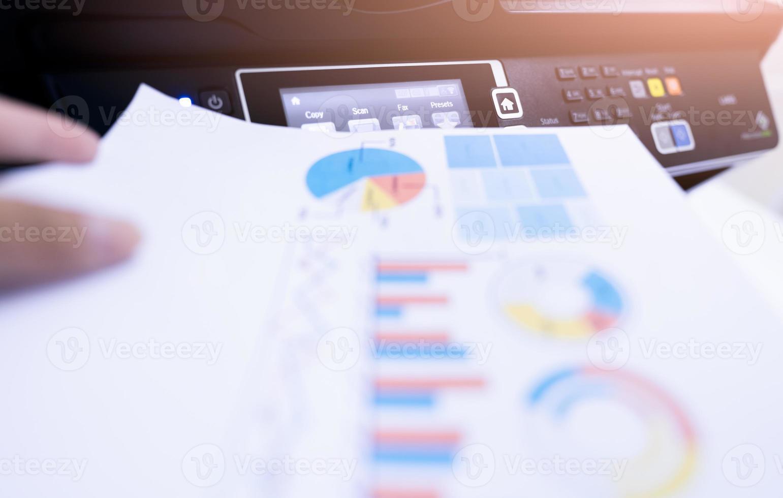 Copy, print, scan, and fax machine in office. Document and paper work