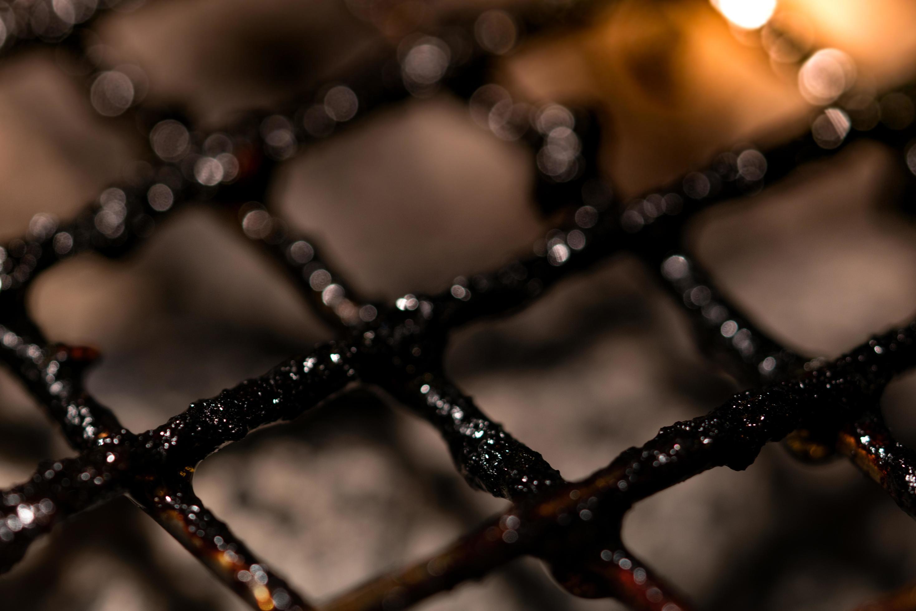 Closeup of dirty and burnt barbecue grill grates. Risk factor of