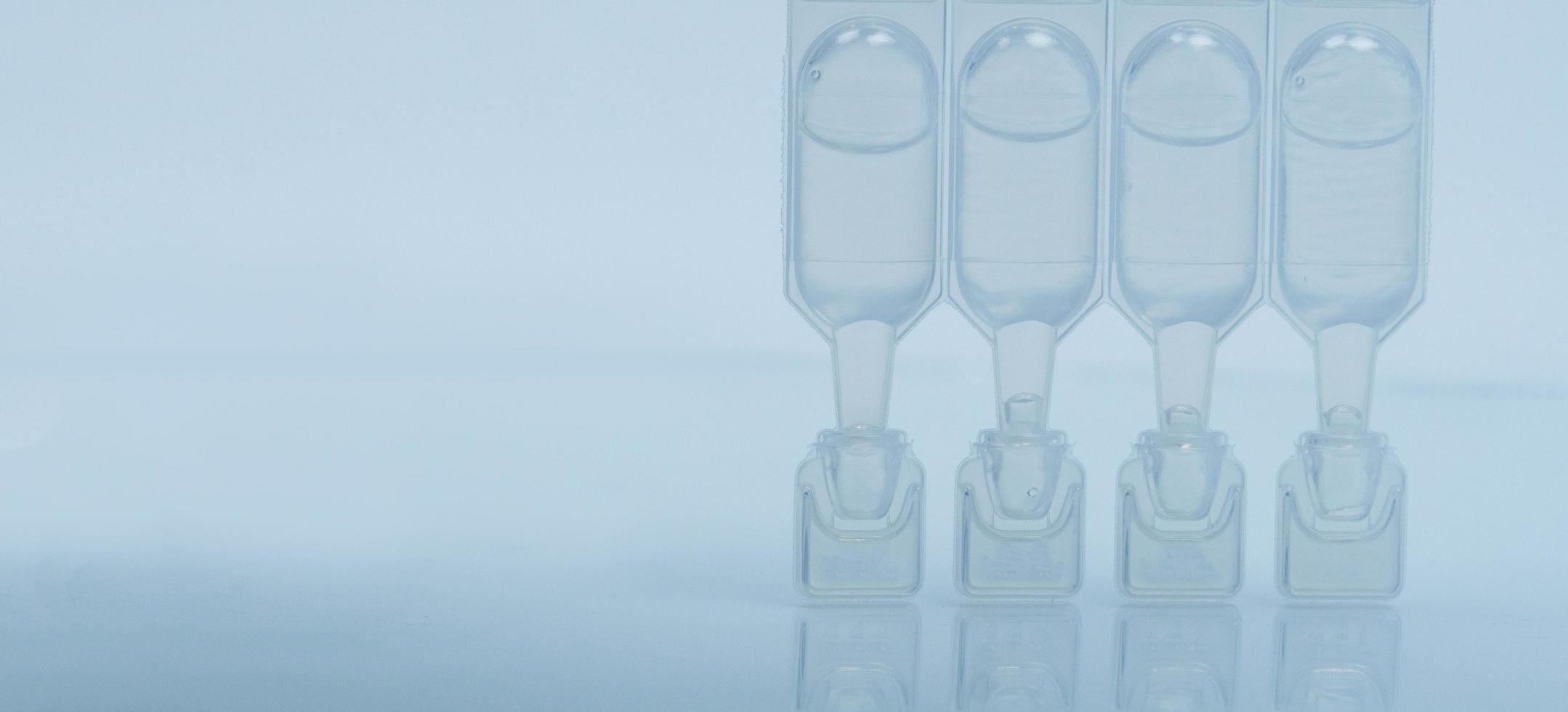 Artificial tears in one day use packaging container with re-closable multi-dose vials. Lubricant eye drops with preservative free. photo